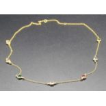 A contemporary 14ct yellow gold and coloured cz set necklace, 3.3g, length 42cmIn good order.