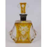 A yellow overlaid cut glass decanter, having silver plated collar, etched with flowers, h.25cmA