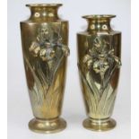 An Art Nouveau style brass vase with applied floral decoration, together with another smaller,