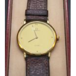 A gent's Omega De Ville gold plated dress watch, having signed and gilded dial, steel back cover and