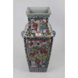 A Chinese Canton vase of tapered rectangular shape, enamel decorated with figures and flowers,