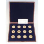 Great Britain, Historic Moments of Queen Elizabeth II Reign, a set of twelve gold plated cupro-