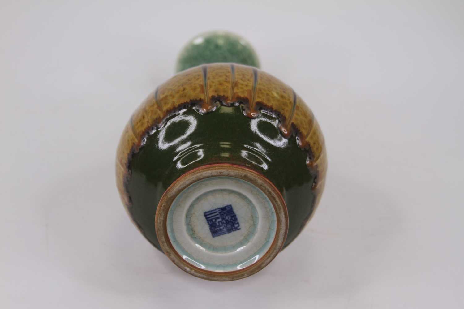 A Chinese porcelain vase, of baluster form, drip-glazed in tones of green, red and brown, h.25cm - Image 2 of 2