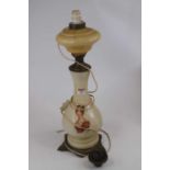 An mid 20th century French opaque glass oil lamp, of baluster shape, printed with "Josephine" and