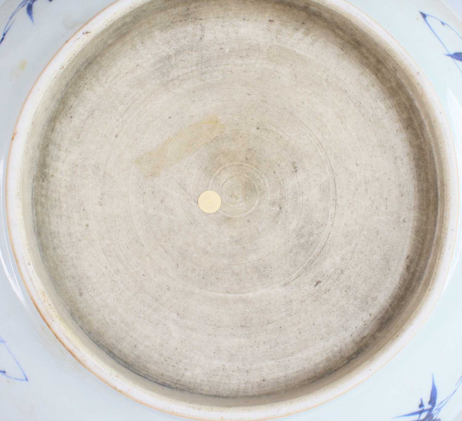 A large Chinese 19th century blue and white stoneware dish, of shallow circular footed form, - Image 4 of 4
