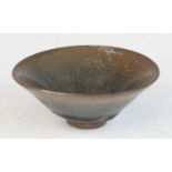 A Chinese Jin Dynasty (1115-1234) stoneware footed tea bowl, of conical form, with 'hare's fur'