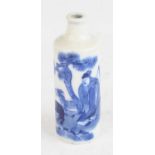 A Chinese circa 1900 blue and white stoneware snuff bottle, of cylindrical form, underglaze