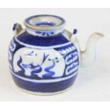 A Chinese 19th century provincial blue and white bachelors teapot and cover, the raised twin-holed