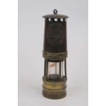 An early 20th century miner's safety lamp by Ackroyd & Best, No.737, h.27cm