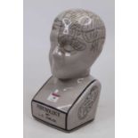 A reproduction ceramic phrenology bust, after the original by L.N. Fowler, h.29cm