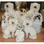 A pair of large Victorian Staffordshire models of seated spaniels; together with various other