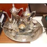 A silver plated tea and coffee service, a silver plated tray and silver plated models of cockerels