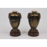 A pair of early 20th century Japanese export porcelain vases, of shouldered baluster shape, gilt