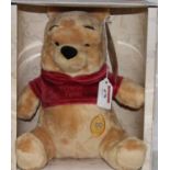 A Disney Winnie the Pooh 90th Years of Friendship commemorative bear in original box with tag to