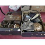 Two boxes of metalware to include chambersticks, copper saucepans, and jelly moulds