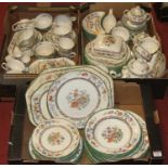 Three boxes of Copeland Spode Chinese Rose pattern tea and dinner wares