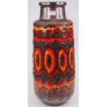 A large 1970s West German ceramic 'fat lava' vase, on a burnished brown ground with red and yellow