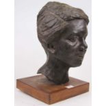 A mid to late 20th century bronze alloy bust of a lady, mounted on a square teak plinth, h.35cm