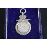 A George V R.A.F. silver fob medal for the Inter-Unit Knockout Cup 1935, maker NAAFI (Navy, Army &