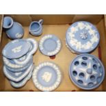 A collection of Wedgwood blue jasperware, to include pot pourri vase, pin dishes, and specimen vase