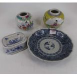 A Chinese porcelain blue & white dish, the centre decorated with trees within a geometric banded