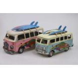 A pair of modern tinplate models of Volkswagon camper vans (2)