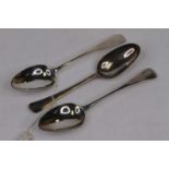 A pair of 19th century silver tablespoons in the Old English pattern; together with an 18th