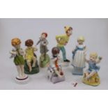 A set of seven Royal Worcester Days of the Week figurines, designed by Frida Doughty, to include