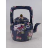 A Chinese blue glazed teapot, enamel decorated with cherries, height 25cm