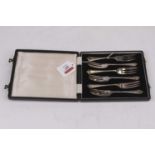 A set of six George VI silver pastry forks, in fitted leather case