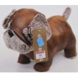 A plush doorstop in the form of a pug dog, h.22cm