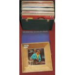 A box of 12" vintage vinyl records, to include Nat King Cole - 20 Golden Greats