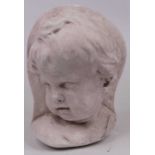 A composition wall mask in the form of a child, h.26cm
