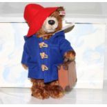 A Steiff Paddington bear soft toy with button to ear and white label numbered 664632 with further