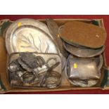A box of silver plated items to include a tray cast handles and table cigarette box