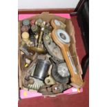 A box of sundry metalware to include a pair of candlesticks, chamberstick, Stanley plane, aneroid