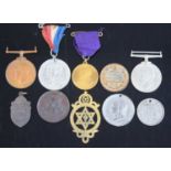 A collection of miscellaneous medals and medallions to include a Faithful Service in the Special