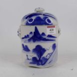 A Chinese blue & white jar and cover underglaze decorated with a landscape and having a domed lid