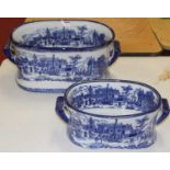 A pair of reproduction blue and white transfer decorated foot baths, the largest w.48cm