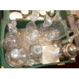 A box of sundry glassware to include mostly decanters and stoppers