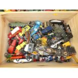 A tray containing an interesting collection of playworn diecast and tinplate vehicles, to include