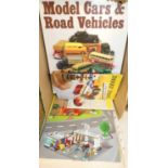 A box of model collecting hardback books and brochures, to include a Lego City poster, Dinky Toys by