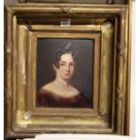 Early 19th century English school - head & shoulders portrait of a lady, oil on board, housed in a