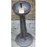 A black painted cast iron footed garden feeder of cylindrical form, height 72.5cm