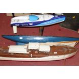 A collection of three various manufactured and kit-built model boats, to include a 1930s pond yacht