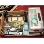 A box of loose and boxed 1/24 and 1/28 scale diecast to include UT Models