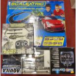 A Scalextric Speed Stars gift set; together with a pair pf radio controlled helicopters by Revell