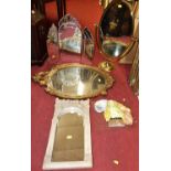 A collection of four sundry mirrors to include; two floral decorated wall mirrors, an oval