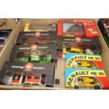 A tray of mixed radio controlled and battery operated vehicles, to include RELE Toys, Polistil and