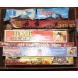A box of childrens board games, to include a Lord of the Rings chess set, an Ideal Corporation